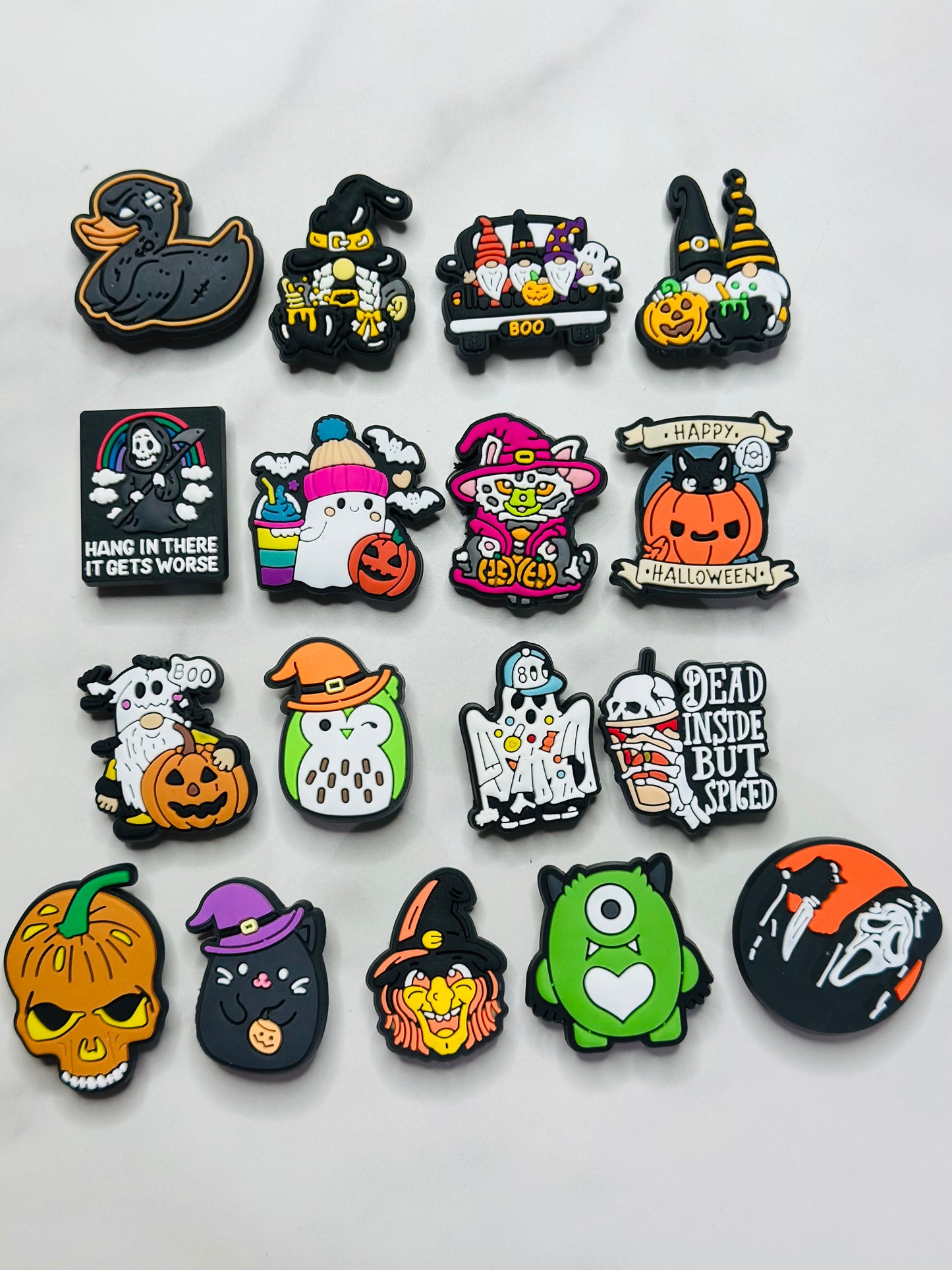 Halloween themed shoe charms for Crocs, Croc compatible diy fall shoe decor, ghosts, pumpkins, skulls, and more
