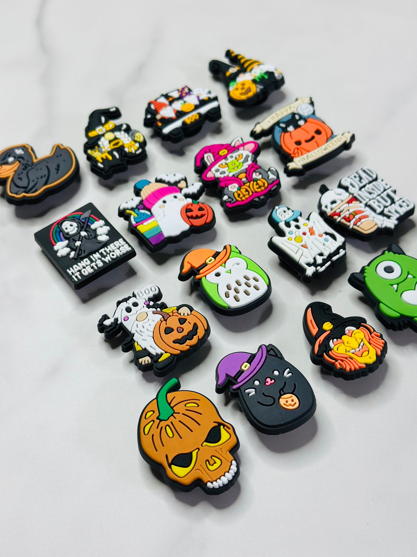 Halloween themed shoe charms for Crocs, Croc compatible diy fall shoe decor, ghosts, pumpkins, skulls, and more
