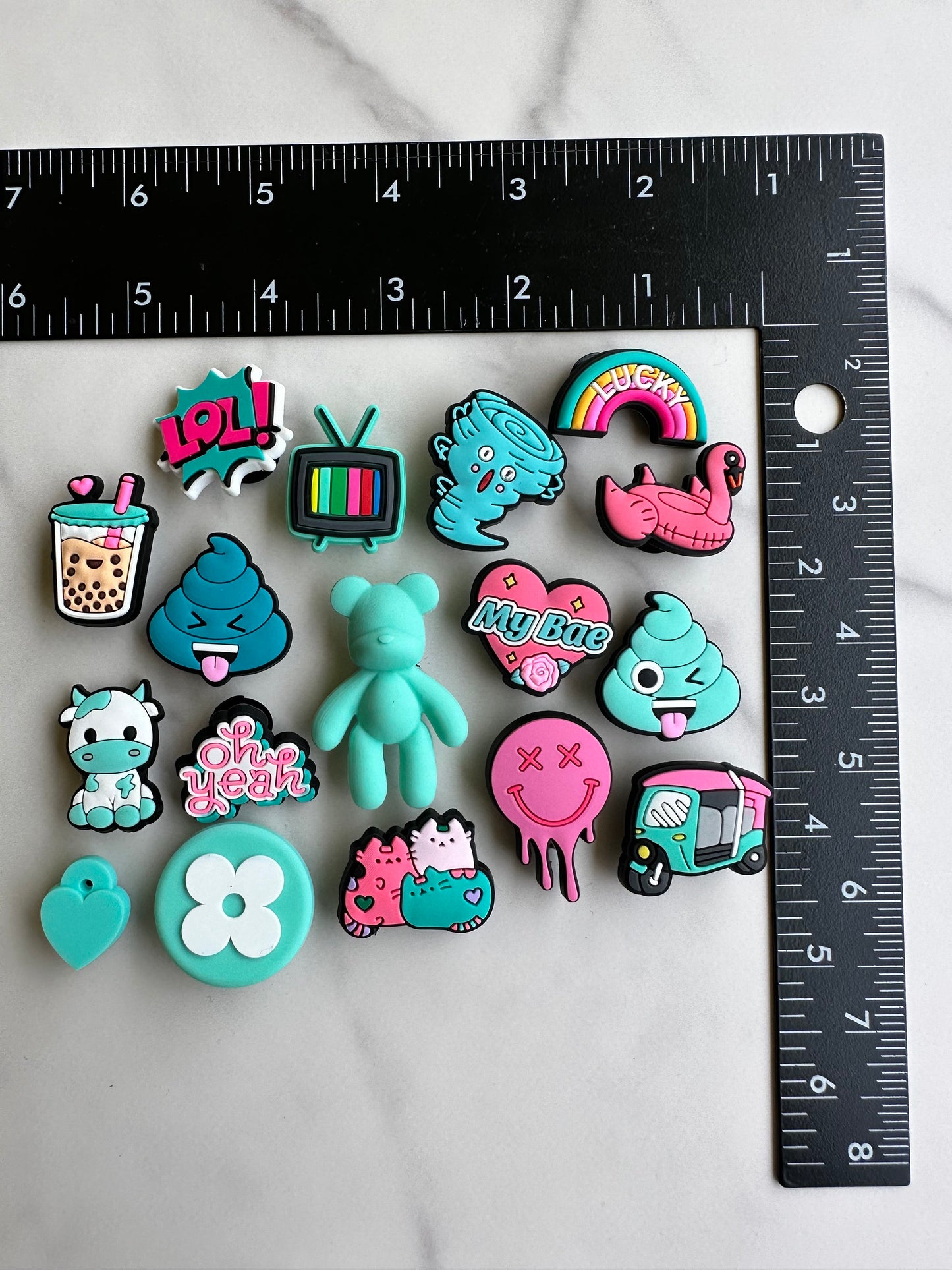 new trending pink and teal charms for your crocs, croc compatible teal and pink shoe charms, trending shoe charms, cute cow charm, boba tea