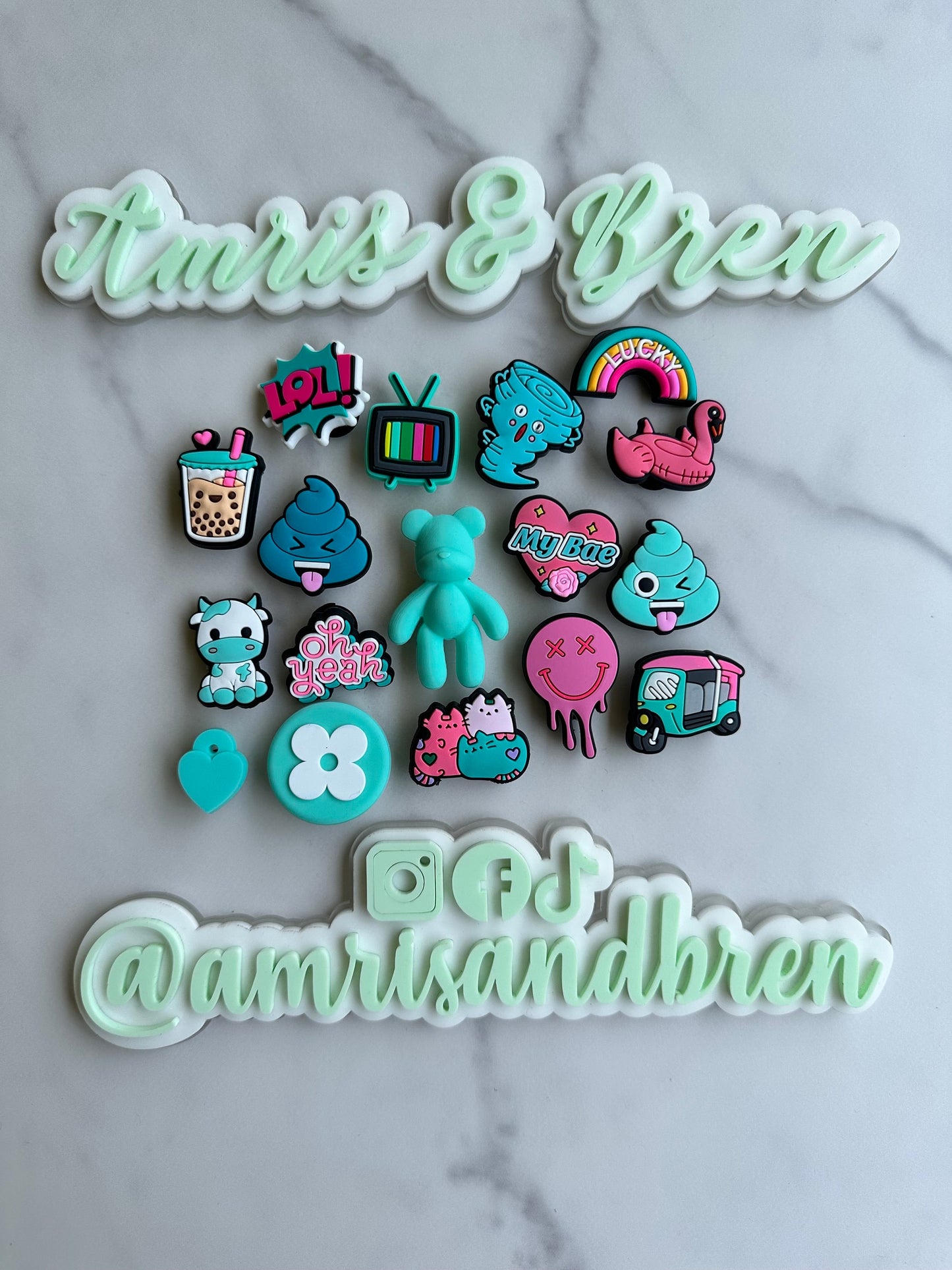 new trending pink and teal charms for your crocs, croc compatible teal and pink shoe charms, trending shoe charms, cute cow charm, boba tea