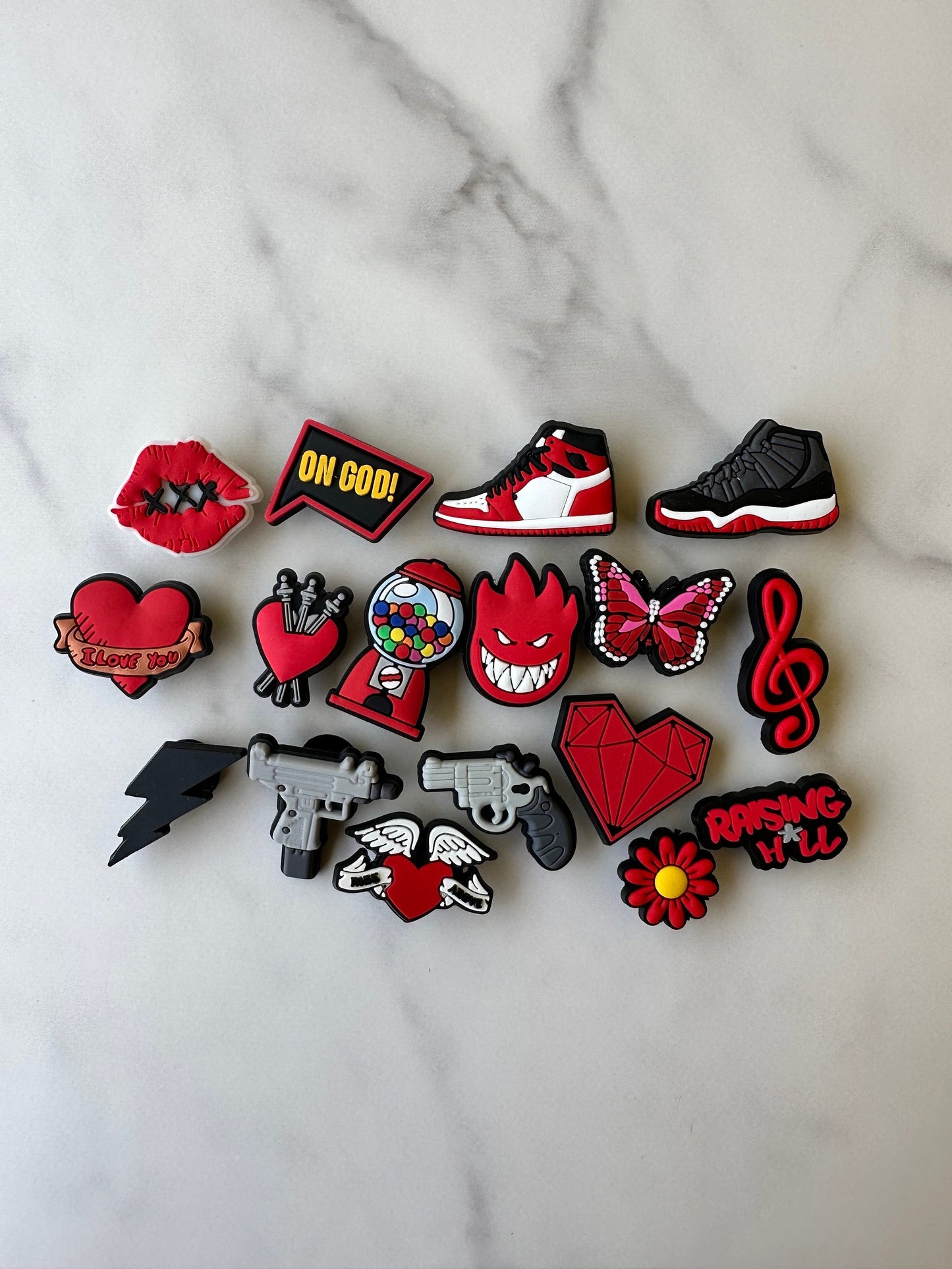 Brand new trending shoe charms for your crocs. Popular croc compatible charms, red and black shoe charms, heart charms, butterfly