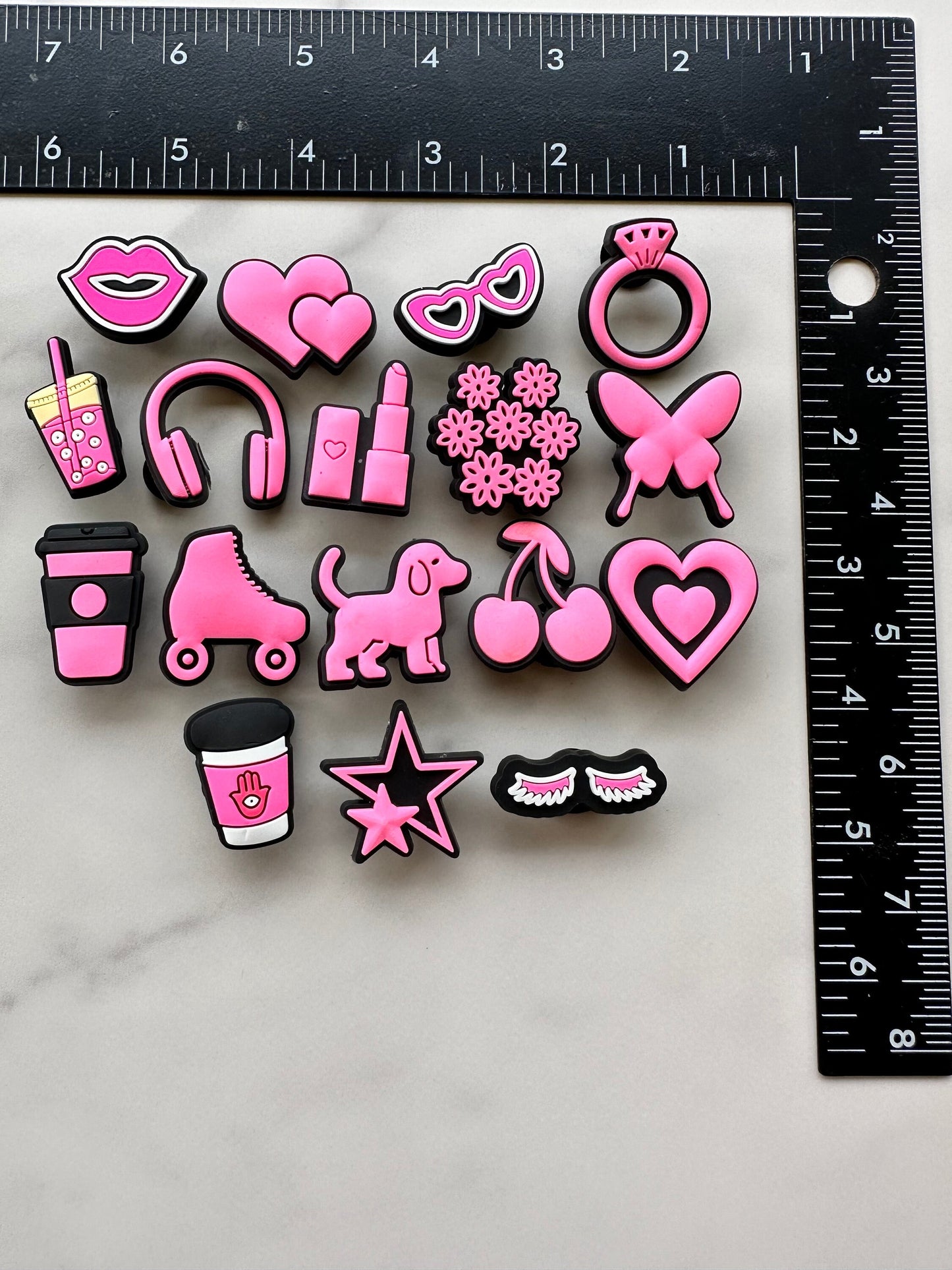 hot pink and black charms for your crocs, croc compatible black and pink shoe charms, trending shoe charms, butterfly, fist